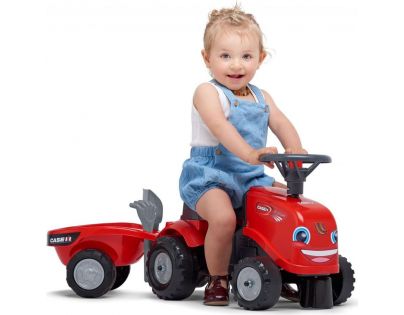 Falk Odstrkovadlo traktor Baby Case IH červený s vlečkou, lopatkou a hrabičkami