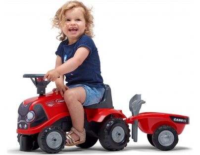 Falk Odstrkovadlo traktor Baby Case IH červený s vlečkou, lopatkou a hrabičkami