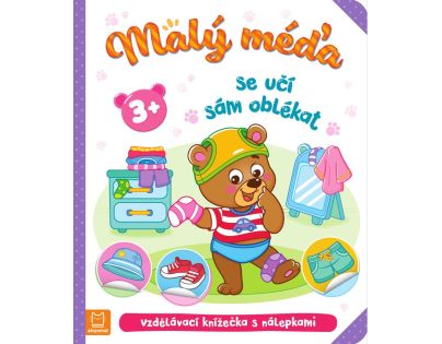Malý méďa se učí sám oblékat