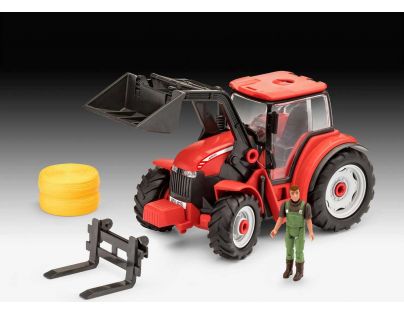 Revell Junior Kit traktor s figurkou 1 : 20 červený