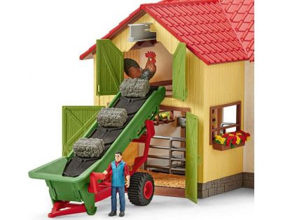 Schleich Zemědělský dopravník na seno s farmářem