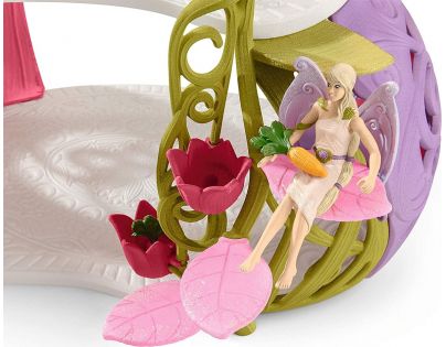 Schleich 42445 Třpytivý květinový dům s jednorožci, jezerem a stájí